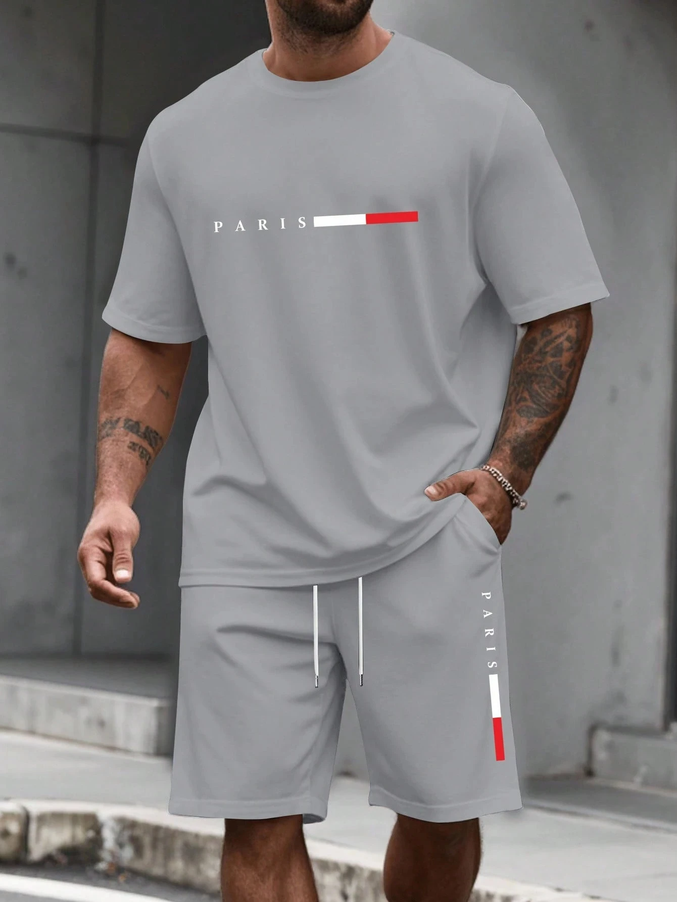 Camiseta y shorts de cuello redondo, cómodos y transpirables, con estampado de letras y estampado urbano para hombre. - Imagen 15