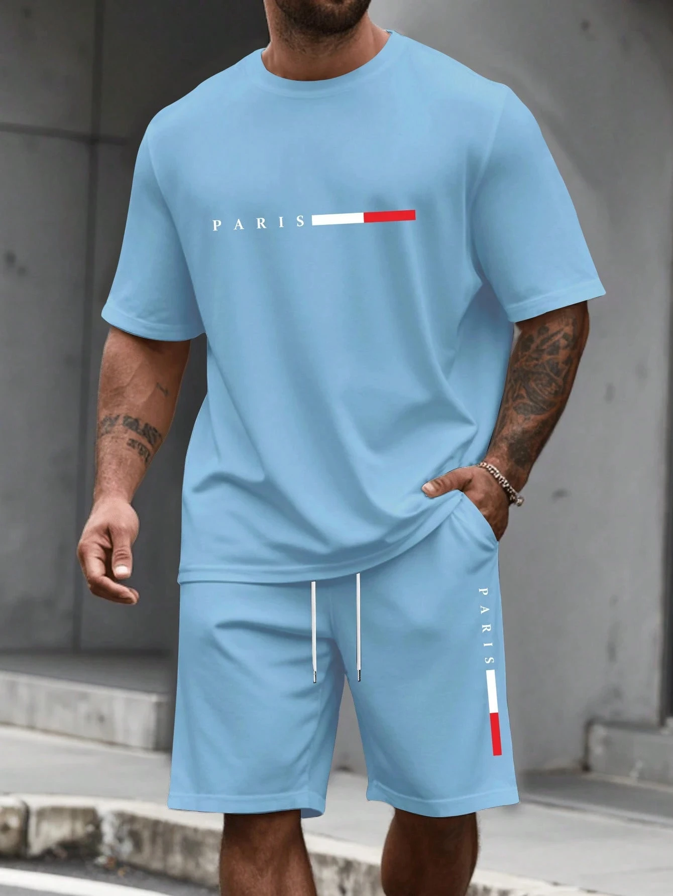 Camiseta y shorts de cuello redondo, cómodos y transpirables, con estampado de letras y estampado urbano para hombre. - Imagen 12